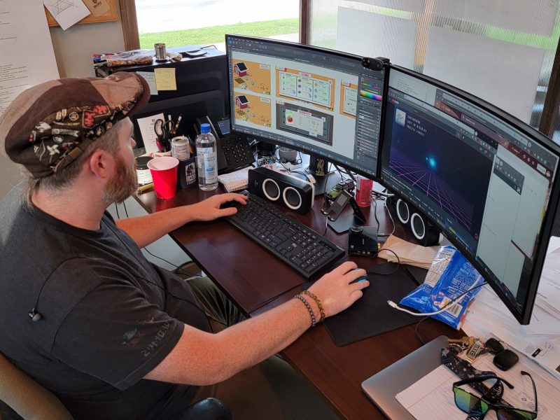 Scott Tuinstra, project manager at Balance Studios, developing an educational game to teach kids about agrivoltaics.