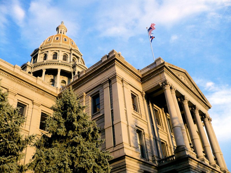 The Colorado State Capitol at dusk.