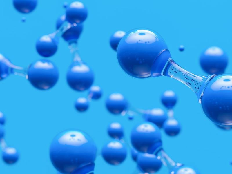 An illustration depicting hydrogen molecules against a blue background.