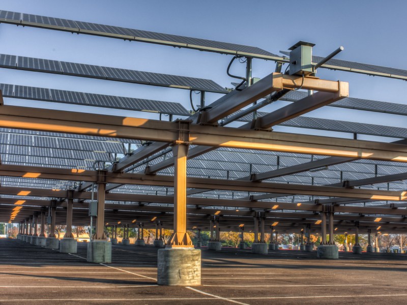 A solar array suspended over a parking lot in Kern County, California.